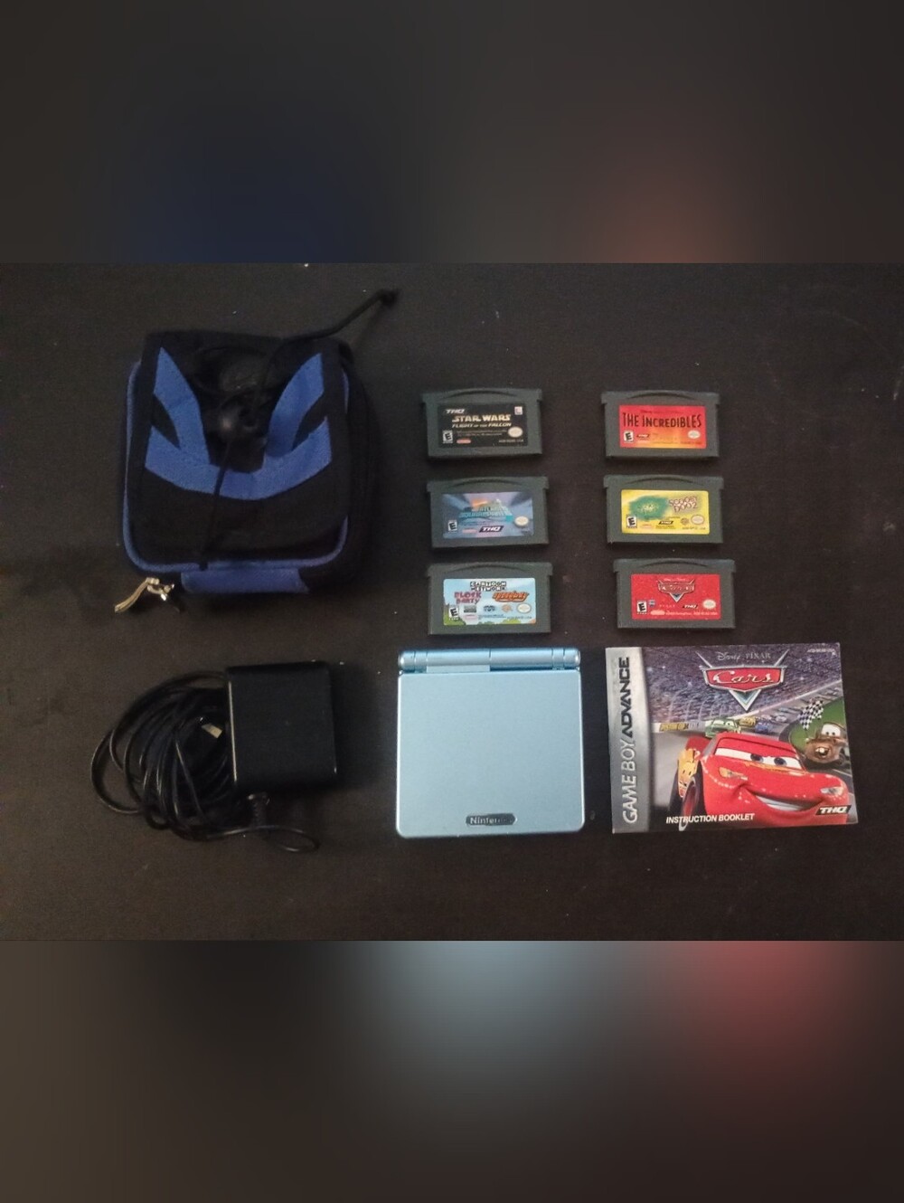 Nintendo Game Boy Advance SP in Oearl Light Blue with 6 Games, Charger & Case